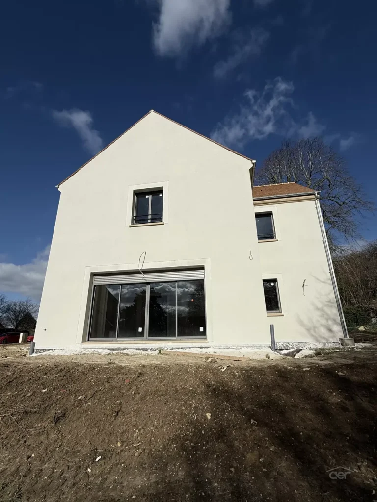 Travaux de façade en Île-de-France - Entreprise AER - Création de façade et pose de plaquettes de parement sur une maison neuve à Saint-Prix (95) - Façade Arrière