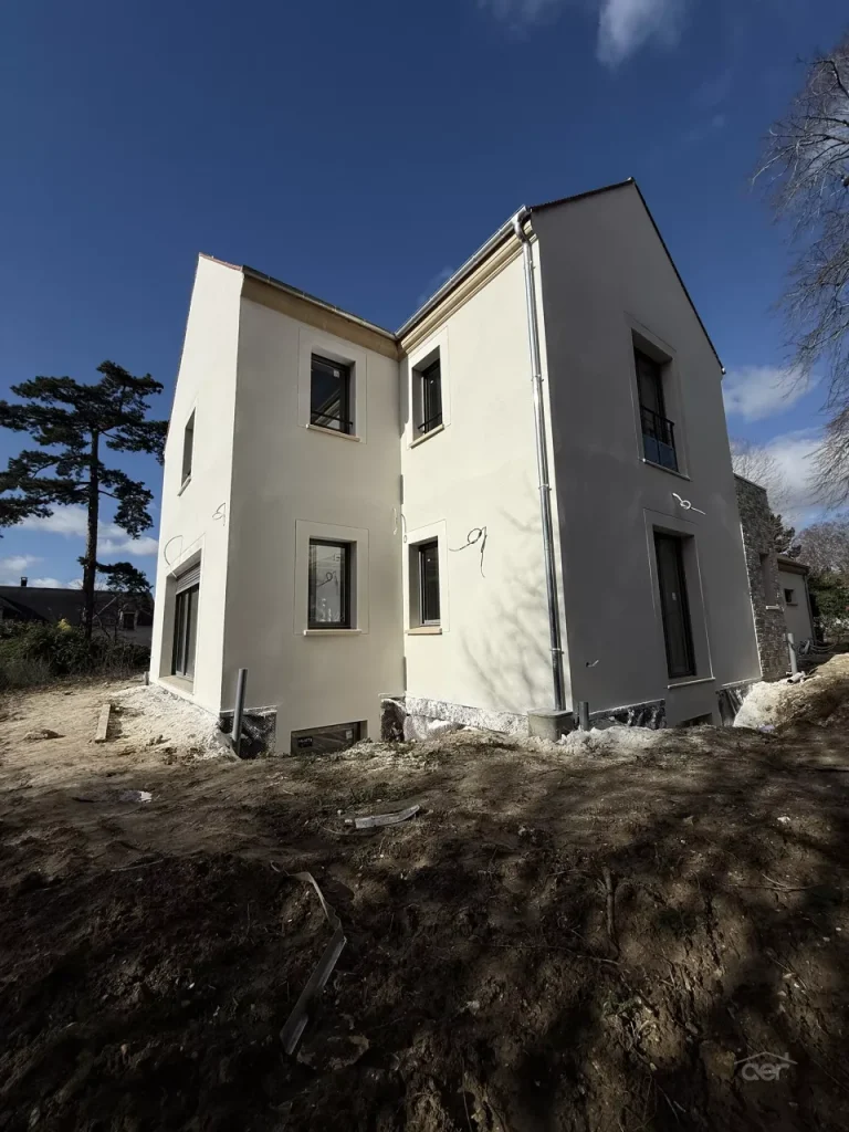 Travaux de façade en Île-de-France - Entreprise AER - Création de façade et pose de plaquettes de parement sur une maison neuve à Saint-Prix (95) - Façade Arrière